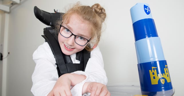Girl with CP in helping aid. Botox for cerebral palsy – does it help?